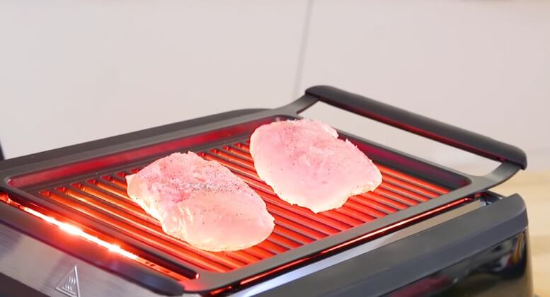 how does a smokeless indoor grill remove the smoke